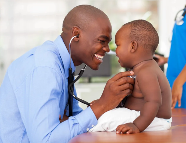 Doctor providing emergency care to baby