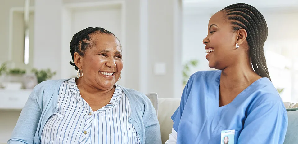 image of nurse with a smiling patient