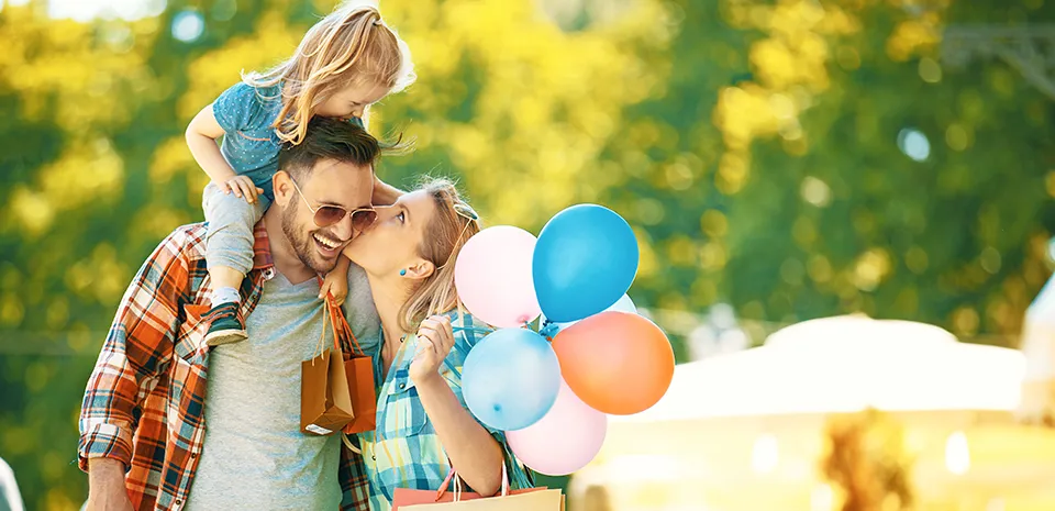 family having fun at amusement park