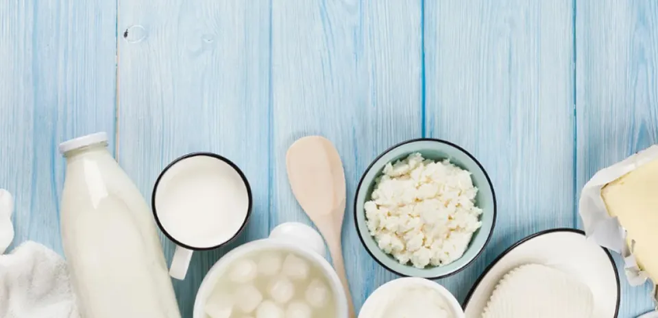 dairy and milk products on blue wood
