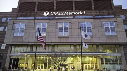 The front entrance of UMass Memorial Medical Center's Memorial Campus at twilight.