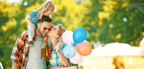 family having fun at amusement park