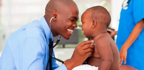 pediatric doctor with baby patient
