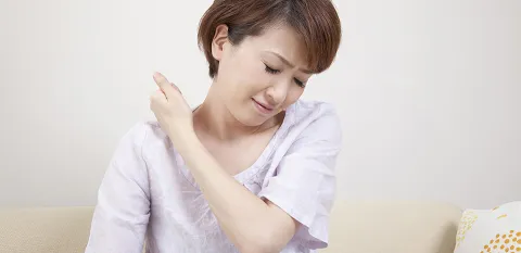 women experiencing neck pain