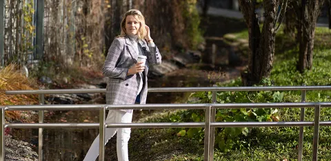 young woman walking in the park alone and quietly