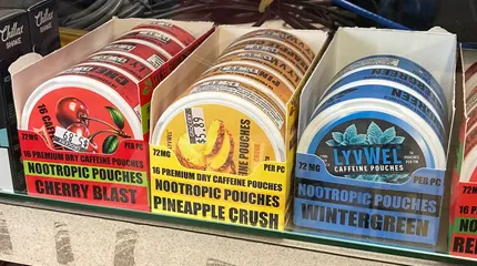 A variety of caffeine pouches available on a store shelf.