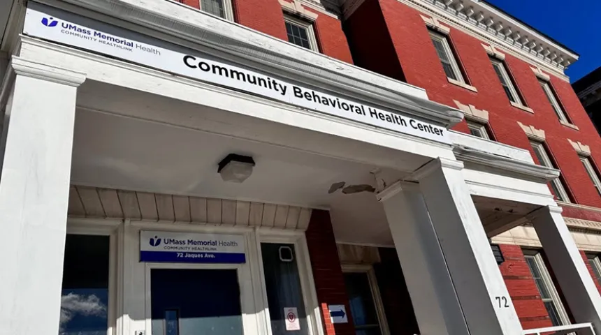 A closeup of the white entryway of Community Healthlink at 74 Jaques Avenue in Worcester.