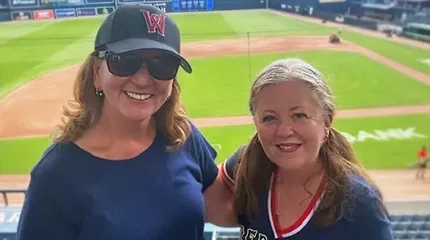 Maureen Corron and Kathleen Melanson, caregivers at UMass Memorial Health – Milford Regional, were recognized as Hometown Heroes at a Worcester Red Sox game. 