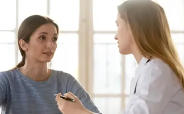 sick patient discussing treatment options with doctor