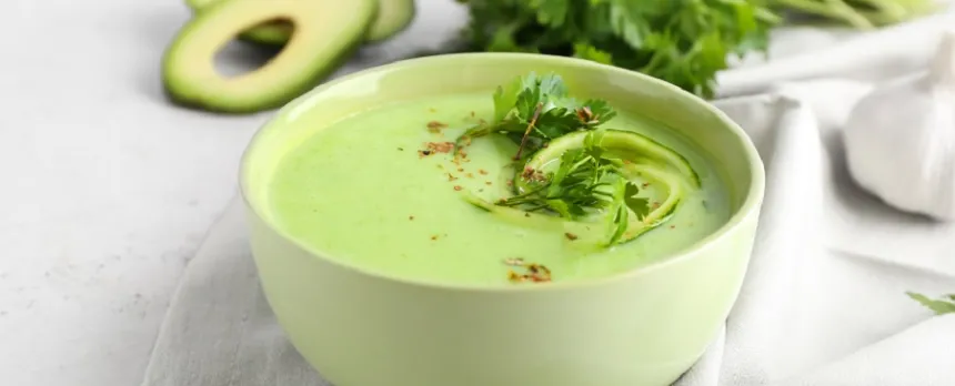 Good for your heart avocado soup in green bowl