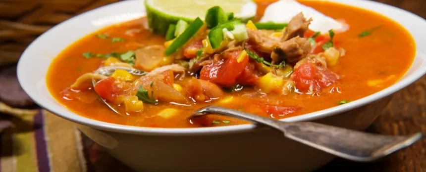 tex mex soup in bowl with chicken corn and black beans