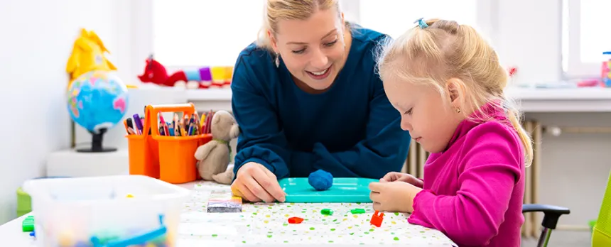 adult painting with child