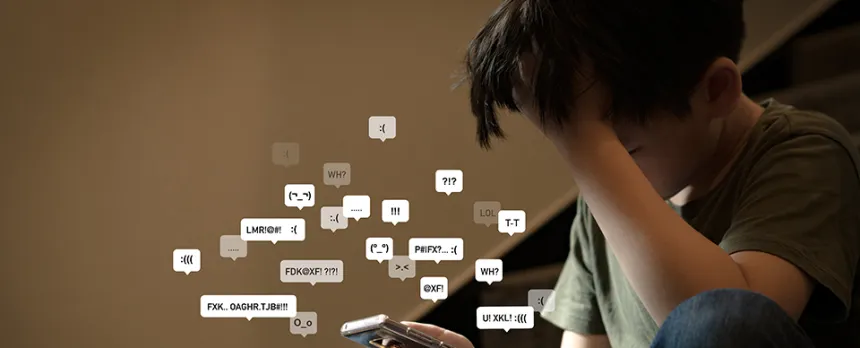 boy being cyberbullied online