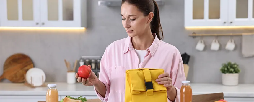 mom preparing lunch for child