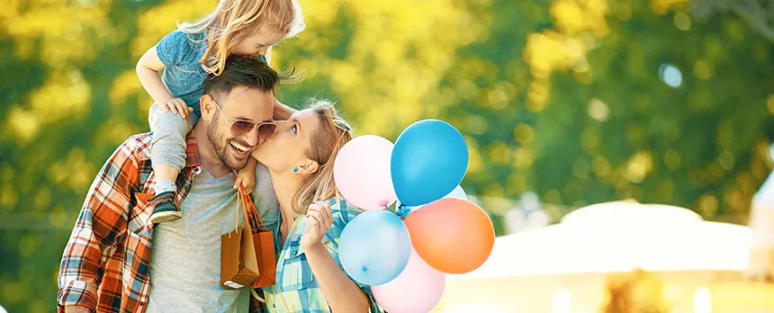 family having fun at amusement park