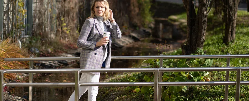 young woman walking in the park alone and quietly